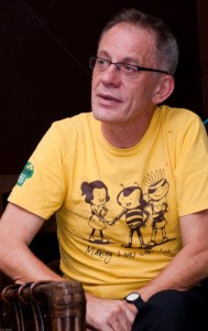 2009-2011 ISE Field Fellow Jenne de Beer wearing a T-shirt that was created to celebrate his work on building a worldwide network of/for wild honey harvesters.